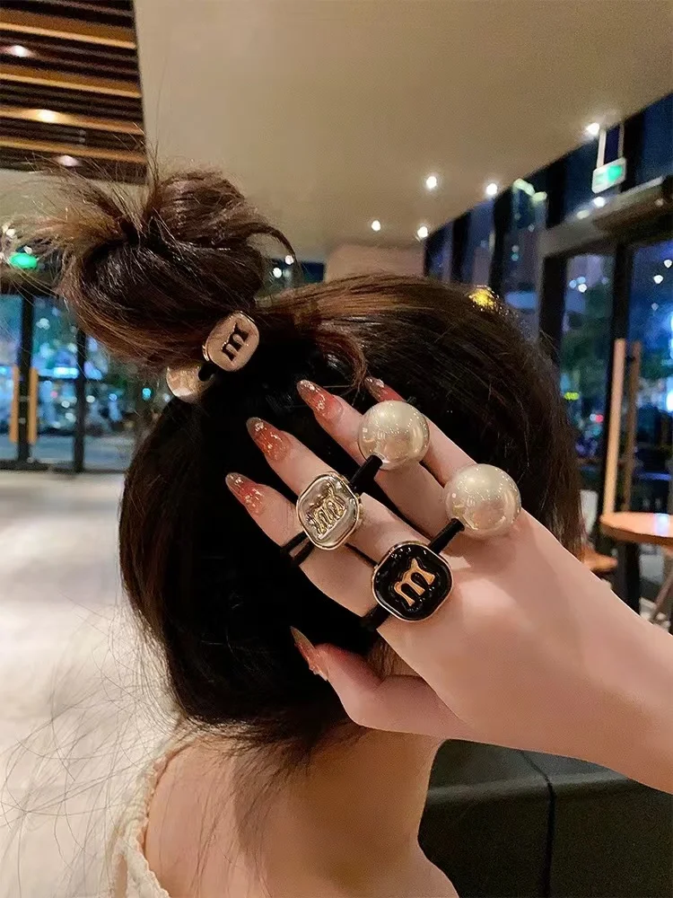 New high-end letter head rope ball hair circle pearl hair accessories hair rope women tied ponytail headwear
New high-end letter head rope ball hair circle pearl hair accessories hair rope women tied ponytail headwear
