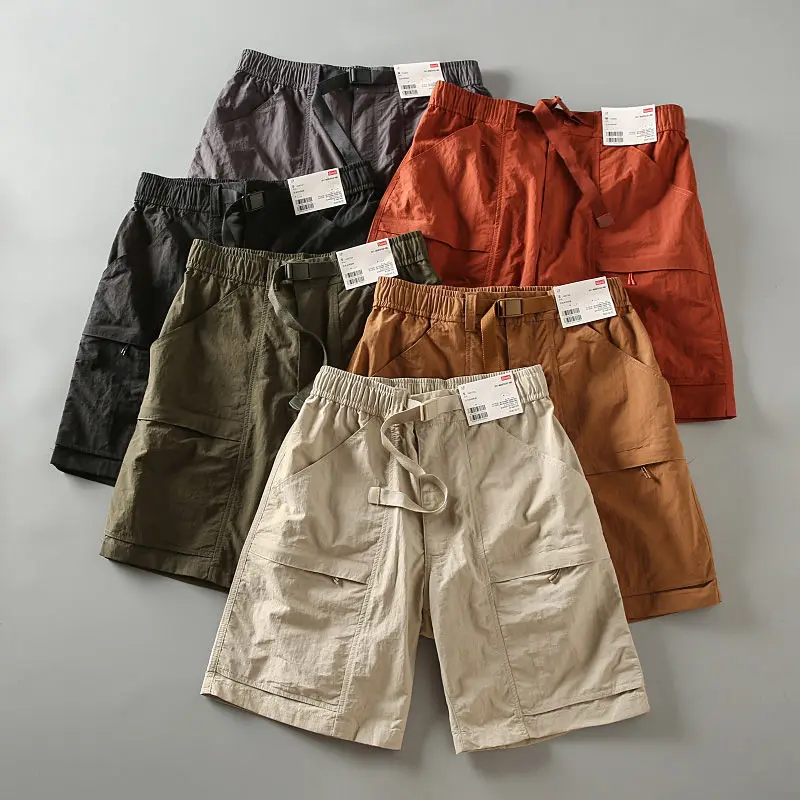 Мужские летние повседневные дышащие быстросохнущие шорты с множеством карманов, рабочая одежда, спортивные шорты, средней длины, с высокой талией, модные, городские.
Мужские летние повседневные дышащие быстросохнущие шорты с множеством карманов, рабочая одежда, спортивные шорты, средней длины, с высокой талией, модные, городские.