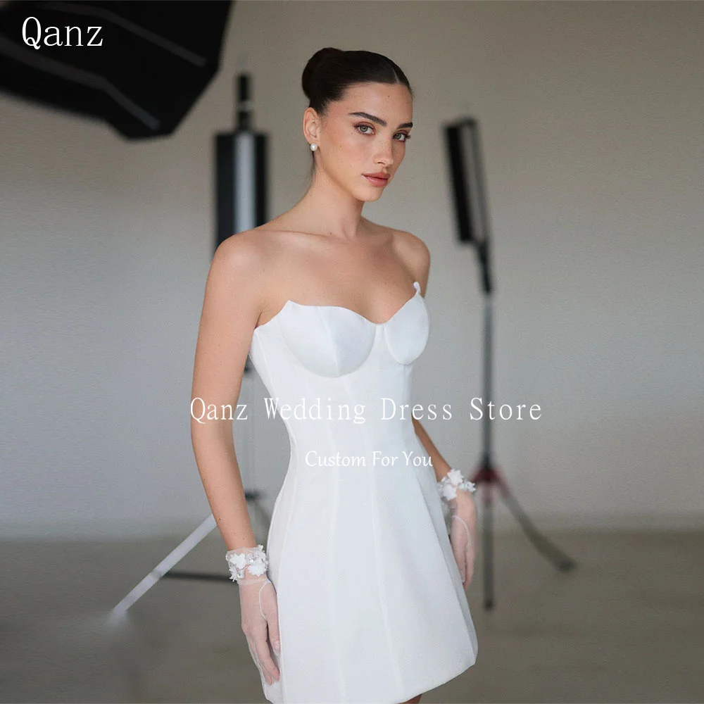Qanz простое короткое платье Vestidos De Novia с корсетом на спине, белое атласное платье Mimi для свадебной фотографии, свадебное платье по индивидуальному заказу
Qanz простое короткое платье Vestidos De Novia с корсетом на спине, белое атласное платье Mimi для свадебной фотографии, свадебное платье по индивидуальному заказу