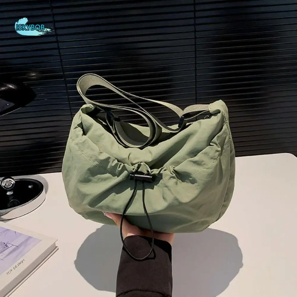 Solid Color Nylon Shoulder Bag Adjustable Shoulder Straps Large Capacity Drawstring Bucket Bag Tote Bag Korean Style
Solid Color Nylon Shoulder Bag Adjustable Shoulder Straps Large Capacity Drawstring Bucket Bag Tote Bag Korean Style