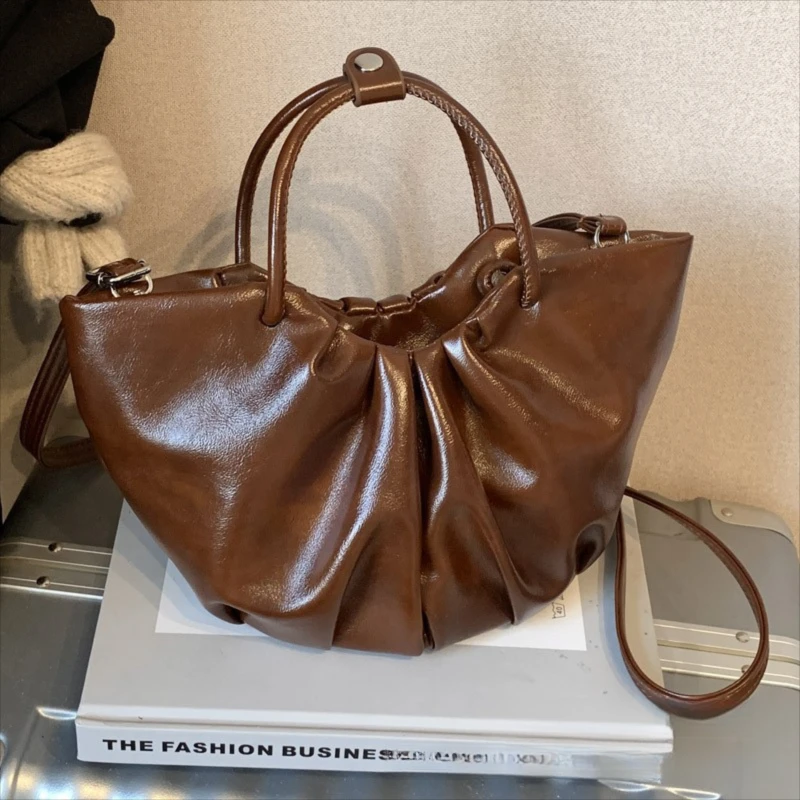 Французская плиссированная сумка-облако, женская модная ручная корзина для овощей из мягкой кожи, универсальная сумка через плечо на одно плечо
Французская плиссированная сумка-облако, женская модная ручная корзина для овощей из мягкой кожи, универсальная сумка через плечо на одно плечо