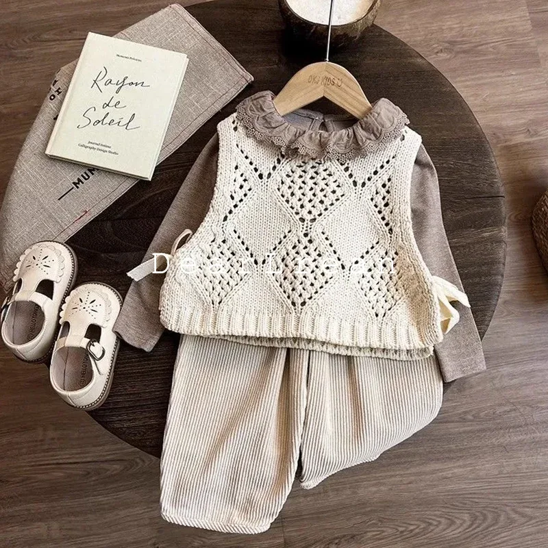 Girls autumn cut-out knitted vest pants three-piece set of cute ins korean jacket sweater for kids
Girls autumn cut-out knitted vest pants three-piece set of cute ins korean jacket sweater for kids
