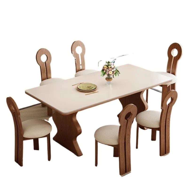 Solid wood rock slab dining table and chair combination rectangular household small apartment modern dining table retro French
Solid wood rock slab dining table and chair combination rectangular household small apartment modern dining table retro French