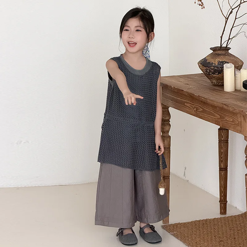Girls' Korean version sleeveless knitted hollow vest, simple vest, summer stylish versatile casual pants
Girls' Korean version sleeveless knitted hollow vest, simple vest, summer stylish versatile casual pants