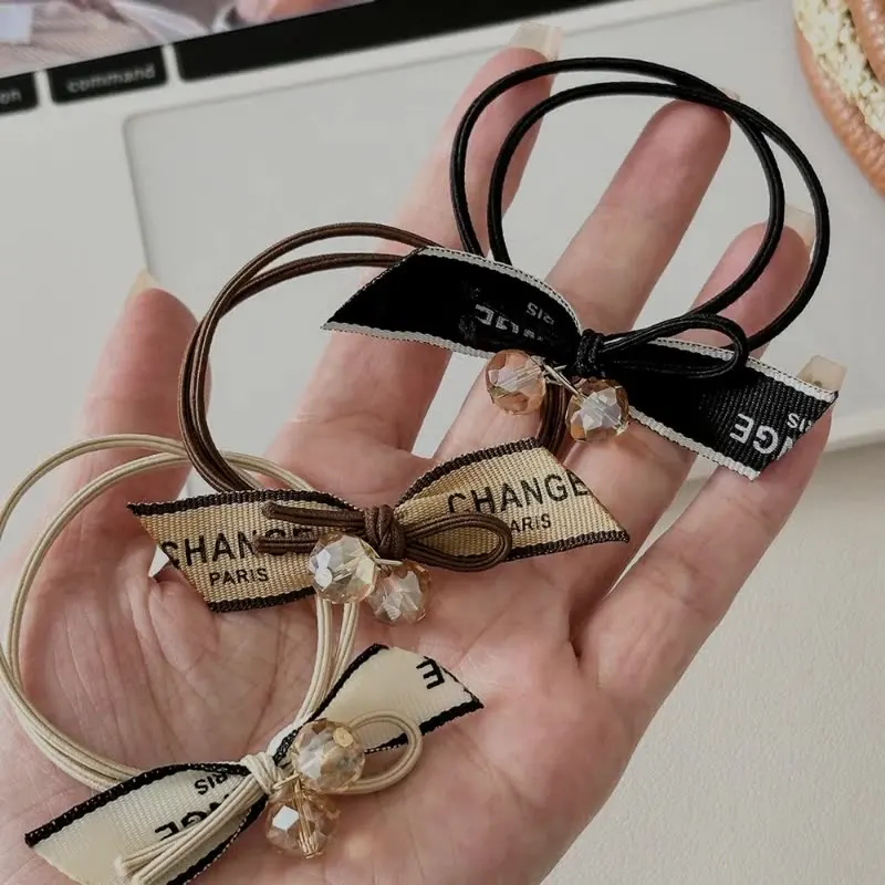 Niche letter ribbon bow hair band headband female high elasticity hair tie leather band hair rope simple temperament hair access
Niche letter ribbon bow hair band headband female high elasticity hair tie leather band hair rope simple temperament hair access