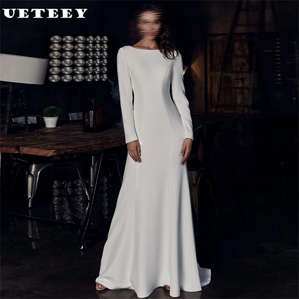 UETEEY Customized Simple Long Sleeves Beaded Crepe Mermaid Wedding Dress Women O Neck Open Back Floor Length Bridal Gown
UETEEY Customized Simple Long Sleeves Beaded Crepe Mermaid Wedding Dress Women O Neck Open Back Floor Length Bridal Gown