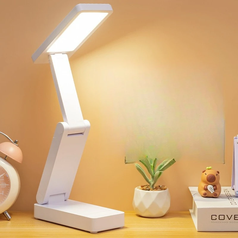 Modern Plastic Foldable Rechargeable LED Eye Care Dimmable Table Lamp Student Study Desk Long Life Battery Decor Novelty New
Modern Plastic Foldable Rechargeable LED Eye Care Dimmable Table Lamp Student Study Desk Long Life Battery Decor Novelty New