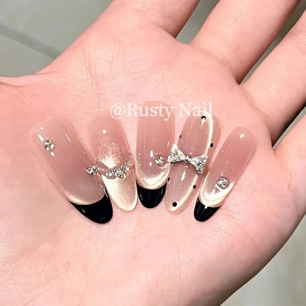 Nude Pink Cat Eye Press On Nails, Long Almond Fake Nails with Black French Tips, 3D Bow & Rhinestones, Glam Glue On Nails for Women
Nude Pink Cat Eye Press On Nails, Long Almond Fake Nails with Black French Tips, 3D Bow & Rhinestones, Glam Glue On Nails for Women