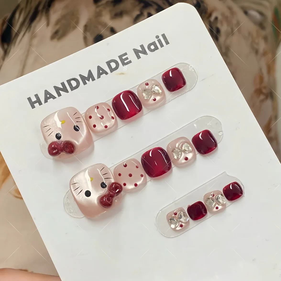 Hello Kitty Red Bow Nail Stickers Summer Cute Polka Dot Press on Nails Full Cover Artificial Nails for Girls Kawaii Manicure Set
Hello Kitty Red Bow Nail Stickers Summer Cute Polka Dot Press on Nails Full Cover Artificial Nails for Girls Kawaii Manicure Set