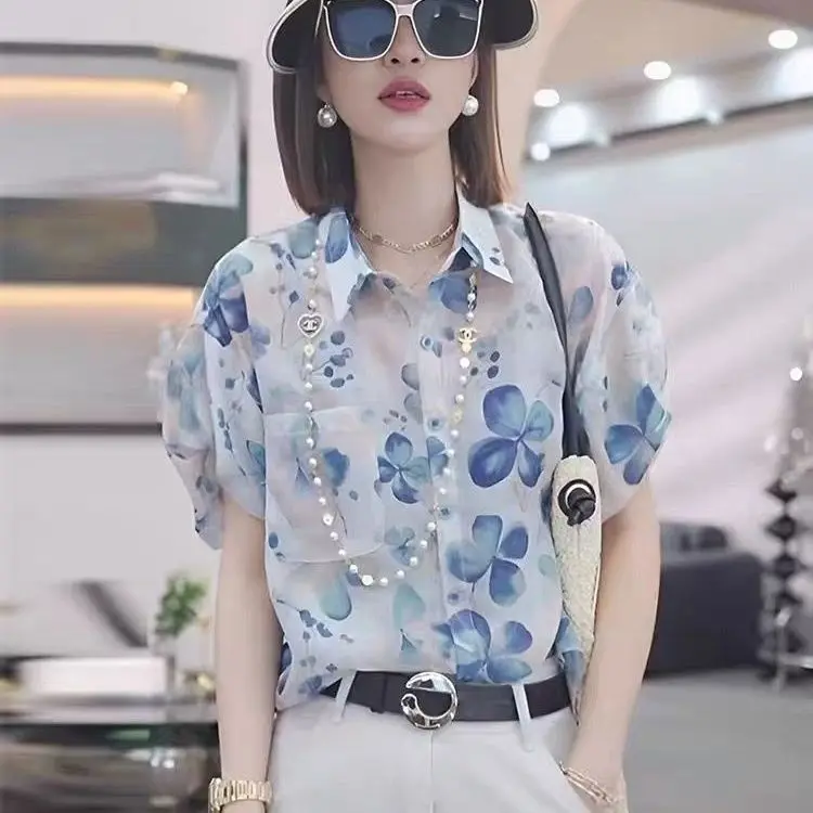 Summer Chiffon New Style Loose Floral Print Shirt with Fashionable Design Elegant Temperament Short Sleeves and Slimming Effect
Summer Chiffon New Style Loose Floral Print Shirt with Fashionable Design Elegant Temperament Short Sleeves and Slimming Effect