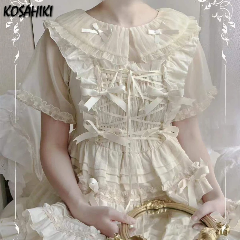 Lolita Sweet Doll Collar Bow Shirt Harajuku Vintage See Through Grunge Fairy Blouses 2025 Summer Y2k Aesthetic Ruffled Cute Tops
Lolita Sweet Doll Collar Bow Shirt Harajuku Vintage See Through Grunge Fairy Blouses 2025 Summer Y2k Aesthetic Ruffled Cute Tops