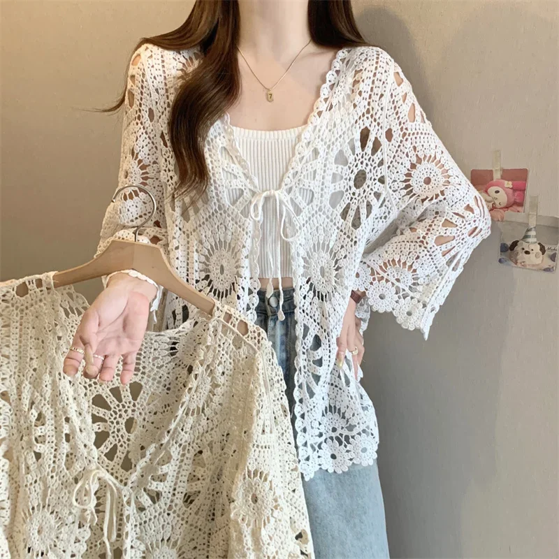 New 2025 Summer Knitted Women's Cardigan Beach Vacation Sunscreen Shirt Bohemian Ethnic Style Crochet Hollow Lace Tops Tees
New 2025 Summer Knitted Women's Cardigan Beach Vacation Sunscreen Shirt Bohemian Ethnic Style Crochet Hollow Lace Tops Tees