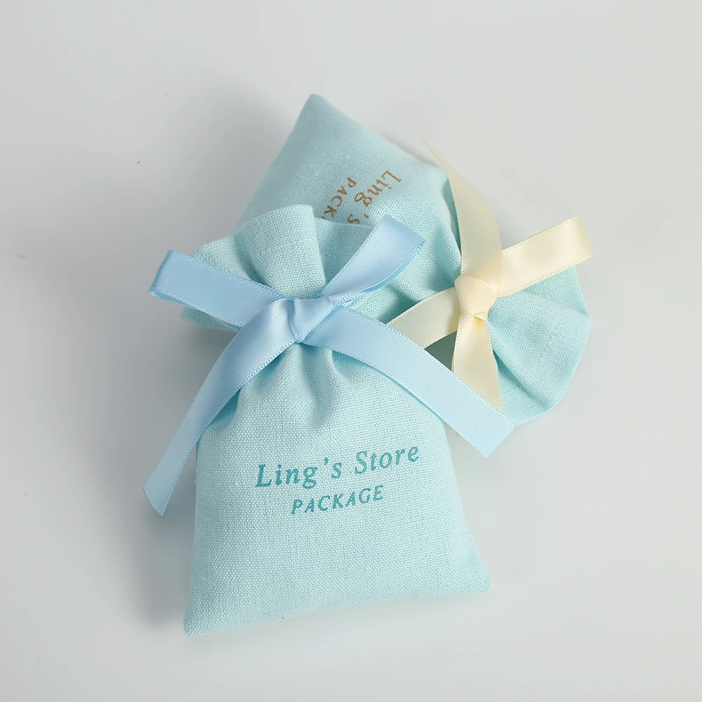 50pcs Customized Elegant Jewelry Cotton Bag With Ribbon Bowknot Canvas Pouch Wedding Bridesmaid's Souvenir Gift Packaging Pocket
50pcs Customized Elegant Jewelry Cotton Bag With Ribbon Bowknot Canvas Pouch Wedding Bridesmaid's Souvenir Gift Packaging Pocket