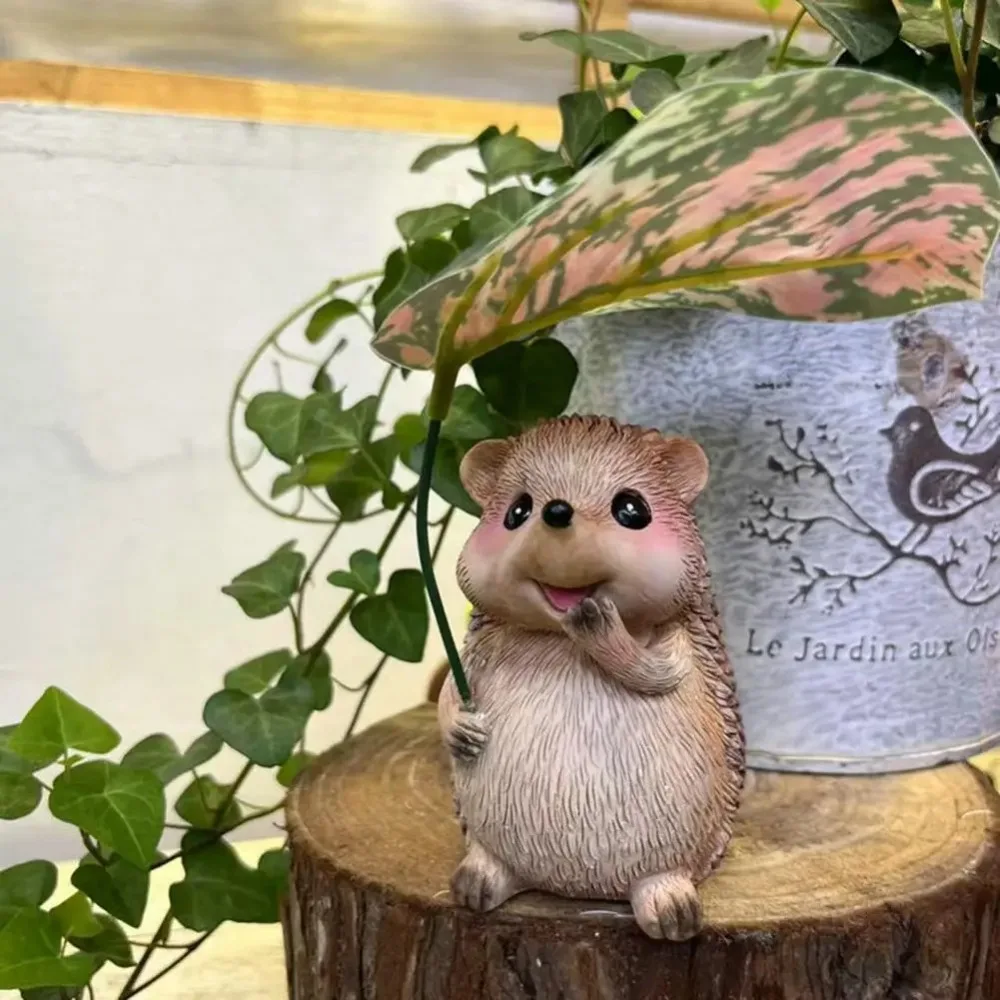 Cute Leaf Umbrella Hedgehog Figurine Resin Handmade Garden Hedgehog Statue Weatherproof Small Hedgehog Sculpture
Cute Leaf Umbrella Hedgehog Figurine Resin Handmade Garden Hedgehog Statue Weatherproof Small Hedgehog Sculpture