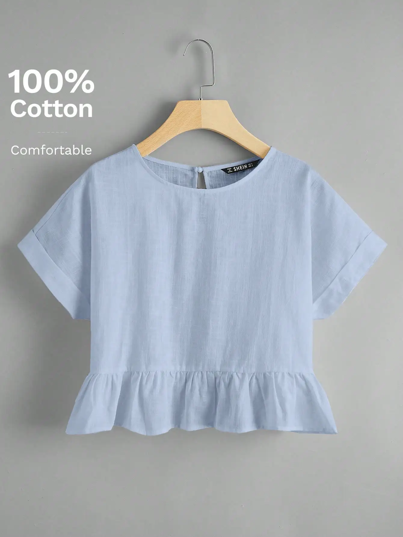 Light Blue Cotton Peplum Top with Keyhole Back and Cuffed Sleeves
Light Blue Cotton Peplum Top with Keyhole Back and Cuffed Sleeves