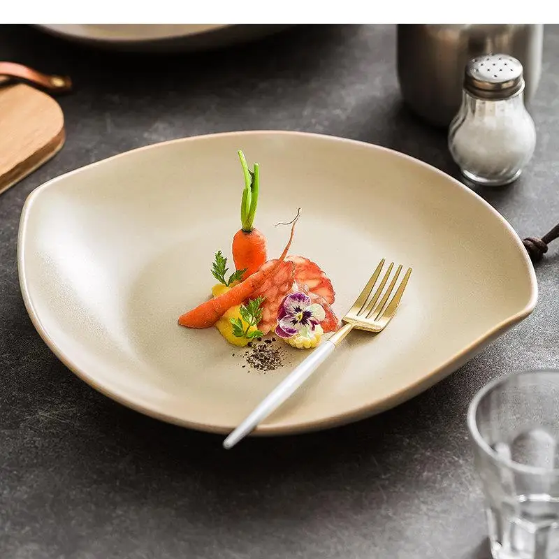 Irregular Shape Ceramic Cooking Dishes Dinner Plates Restaurant Solid Color Tableware Steak Sushi Plate Serving Dish
Irregular Shape Ceramic Cooking Dishes Dinner Plates Restaurant Solid Color Tableware Steak Sushi Plate Serving Dish