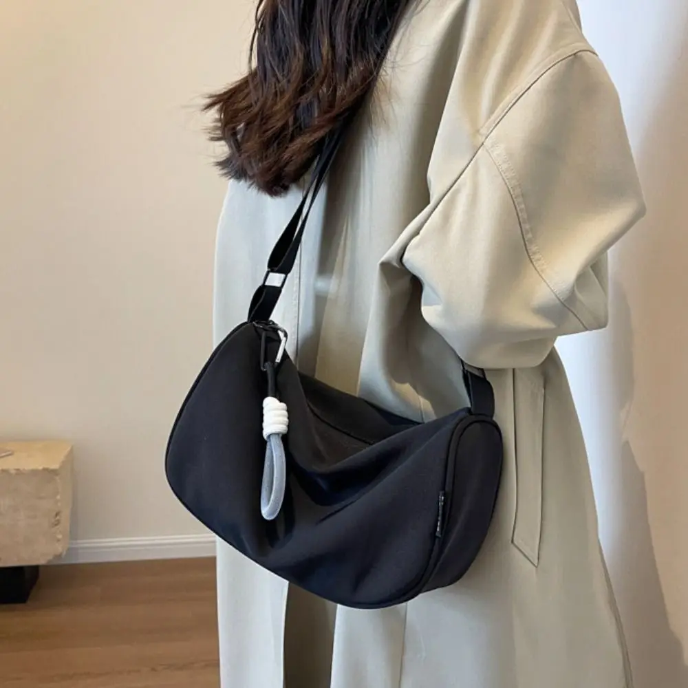Korean Style Solid Color Hand Bag with Short Lanyard Pendant Dumplings Bag Light Soft Nylon Bag Tote Bag Large Capacity
Korean Style Solid Color Hand Bag with Short Lanyard Pendant Dumplings Bag Light Soft Nylon Bag Tote Bag Large Capacity
