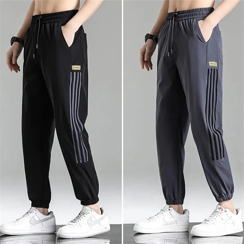Pants Men's Summer Casual Sports Pants Tide Sweatpants Loose Summer Black Bundle Foot Speed Dry Trousers Tracksuit Pants Male
Pants Men's Summer Casual Sports Pants Tide Sweatpants Loose Summer Black Bundle Foot Speed Dry Trousers Tracksuit Pants Male