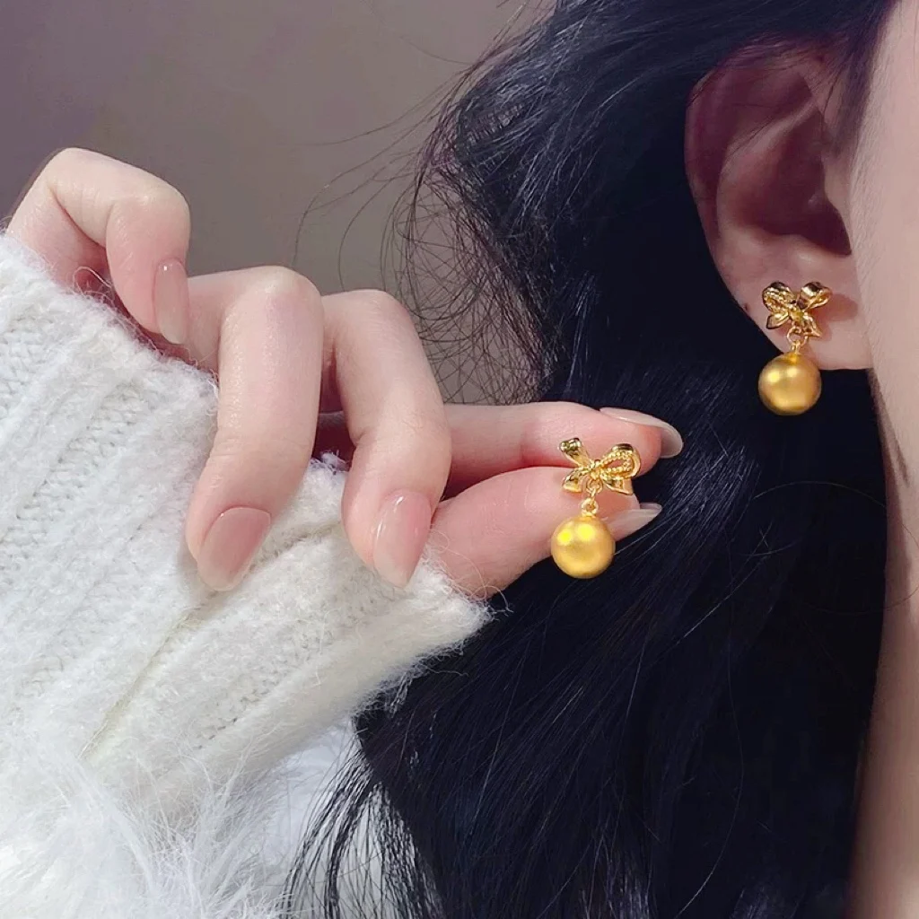 24K Gold AU999 Women's Bowknot Bead Earrings - 3D Bow with Polished Beads, Fine Texture, Luxury Nimble Flattering Charm
24K Gold AU999 Women's Bowknot Bead Earrings - 3D Bow with Polished Beads, Fine Texture, Luxury Nimble Flattering Charm