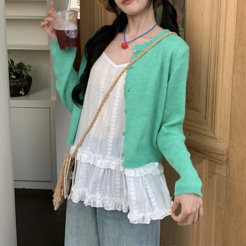 New Solid Color Long Sleeve Knitted Cardigan Women Clothing All-match Slim O-neck Tops Women Spring Summer Korean Style Knitter
New Solid Color Long Sleeve Knitted Cardigan Women Clothing All-match Slim O-neck Tops Women Spring Summer Korean Style Knitter