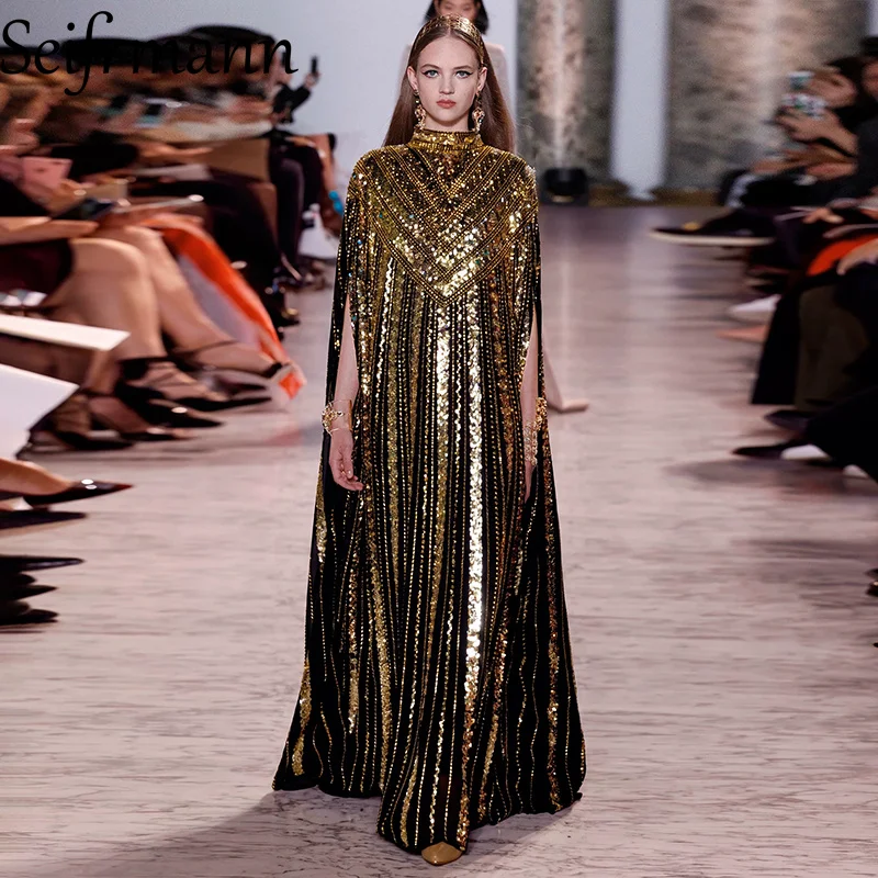 Seifrmann Spliced sequin dress stand collar bat sleeves beaded loose long dress 2026 summer women's new style
Seifrmann Spliced sequin dress stand collar bat sleeves beaded loose long dress 2026 summer women's new style