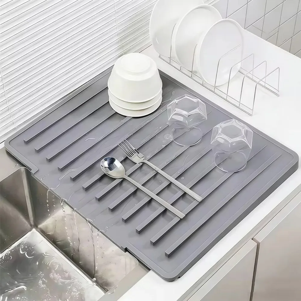 Slope Design Silicone Drain Mat Anti-hot Pan Mat Kitchen Storage Accessory Kitchen Drain Quickly Mat Thickening Dish Drying Mat
Slope Design Silicone Drain Mat Anti-hot Pan Mat Kitchen Storage Accessory Kitchen Drain Quickly Mat Thickening Dish Drying Mat