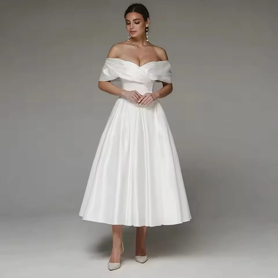 Charming White Cocktail Dresses Off Shoulder Satin A Line Prom Gowns Tea Length Customized Formal Party Wedding Guest Skirts
Charming White Cocktail Dresses Off Shoulder Satin A Line Prom Gowns Tea Length Customized Formal Party Wedding Guest Skirts