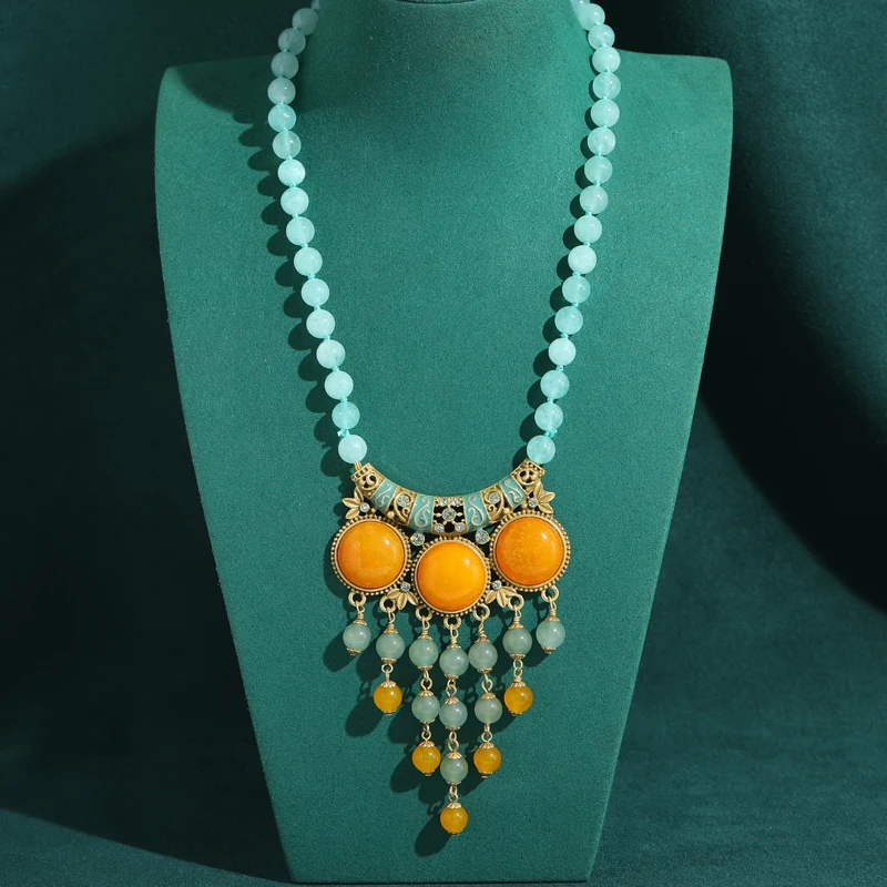 Vintage Blue Beeswax Yellow Beads Necklace Pendent Long Tassel Round Natural Stone Exaggerated High Quality Gold Color Jewelry
Vintage Blue Beeswax Yellow Beads Necklace Pendent Long Tassel Round Natural Stone Exaggerated High Quality Gold Color Jewelry