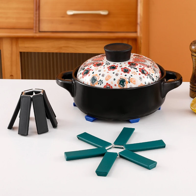 Foldable Heat Resistant Placemat Dining Table Mat Plastic Insulation Coaster Pads for Pan Pot Bowl Holder utensilios de cocina
Foldable Heat Resistant Placemat Dining Table Mat Plastic Insulation Coaster Pads for Pan Pot Bowl Holder utensilios de cocina