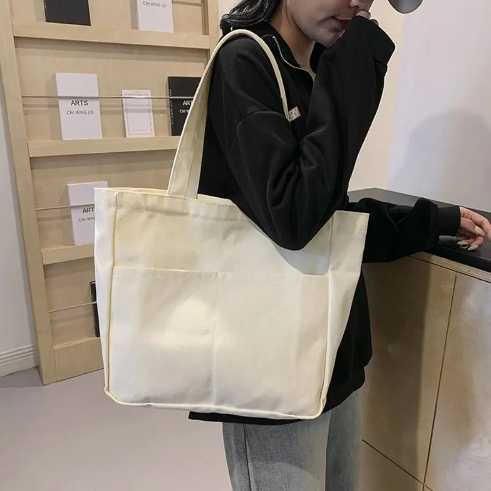 Portable Solid Color Canvas Tote Bag Pocket Large Capacity Shopping Handbag Korean Style Square Cloth Shoulder Bag Students
Portable Solid Color Canvas Tote Bag Pocket Large Capacity Shopping Handbag Korean Style Square Cloth Shoulder Bag Students