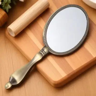 Retro Handheld Compact Metal Makeup Mirror Portable Travel Vintage Design Lightweight Travel Handheld Mirror for Women Makeup 
Retro Handheld Compact Metal Makeup Mirror Portable Travel Vintage Design Lightweight Travel Handheld Mirror for Women Makeup