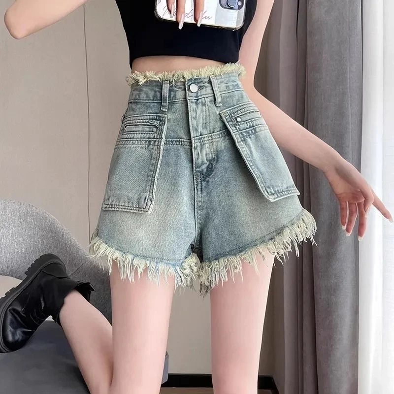 Pocket Design Denim Shorts for women's Spring Summer New High waist Loose Fringed fringe Wide Leg pants lady Versatile Hot pants
Pocket Design Denim Shorts for women's Spring Summer New High waist Loose Fringed fringe Wide Leg pants lady Versatile Hot pants