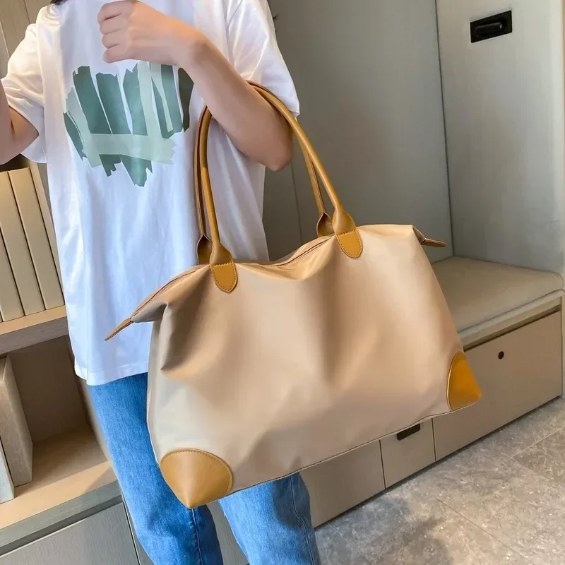2026ss Ladies' short distance travel bag, British style large capacity luggage bag, hand-held bill of lading shoulder sports bag
2026ss Ladies' short distance travel bag, British style large capacity luggage bag, hand-held bill of lading shoulder sports bag