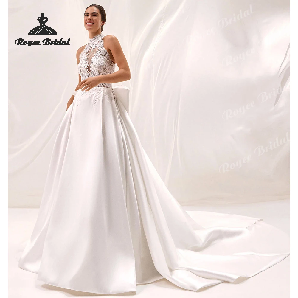 Princess Halter Open Back A Line Wedding Dresses 2026 Detachable Train Plus Size Beach Bridal Gown Customized vestido de novia
Princess Halter Open Back A Line Wedding Dresses 2026 Detachable Train Plus Size Beach Bridal Gown Customized vestido de novia