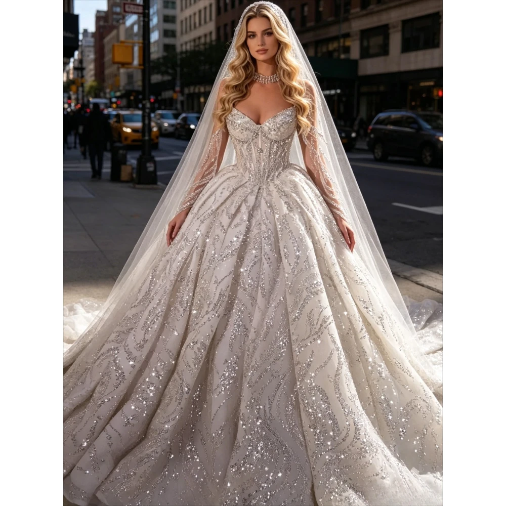 Customized Sparkling Bead Wedding Dress 2026 Metal Sequins and Lace Combination Strapless Sleeveless Chapel Trailing Bridal Gown
Customized Sparkling Bead Wedding Dress 2026 Metal Sequins and Lace Combination Strapless Sleeveless Chapel Trailing Bridal Gown
