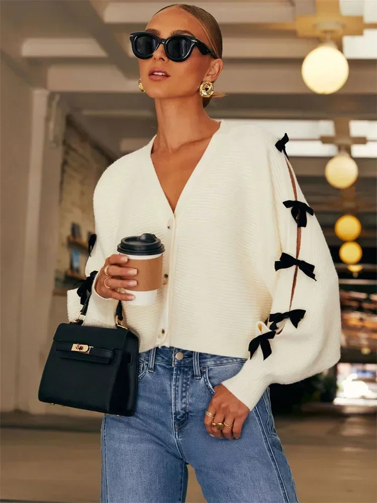 Tee Bow Knit Cardigan Sweater Women V-Neck Ribbed Hollow Out Casual Contrast Lace-Up Knitwear Coat Female Elegant Outwear
Tee Bow Knit Cardigan Sweater Women V-Neck Ribbed Hollow Out Casual Contrast Lace-Up Knitwear Coat Female Elegant Outwear