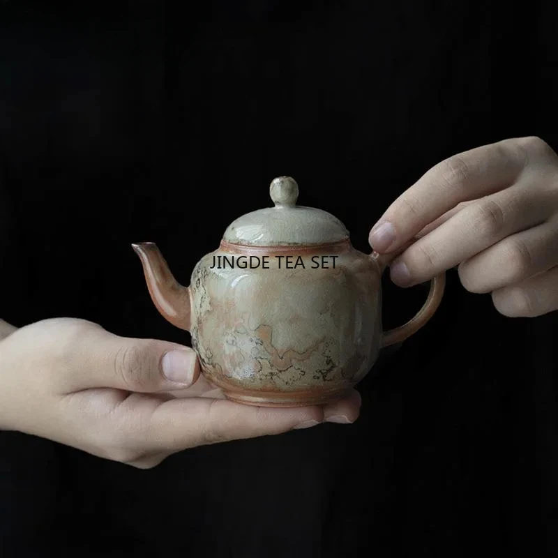 Japanese porcelain teapot retro stone tool Chinese tea brewing pot tea ceremony accessories
Japanese porcelain teapot retro stone tool Chinese tea brewing pot tea ceremony accessories