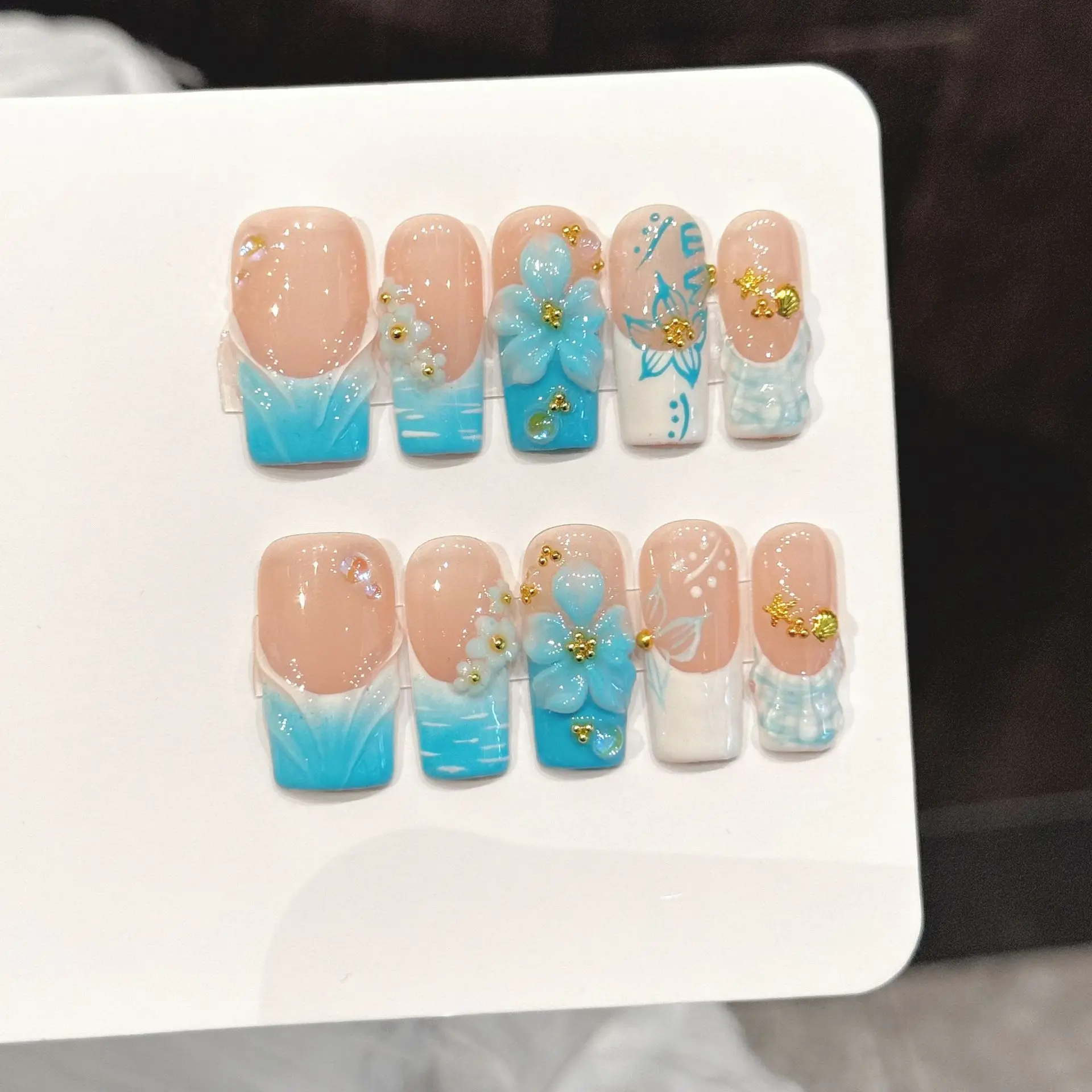 10pcs Ocean Blue French Style Press On Nails Handmade 3D Carving Flower Gold Beads Decor False Nails Summer Detachable Fake Nail
10pcs Ocean Blue French Style Press On Nails Handmade 3D Carving Flower Gold Beads Decor False Nails Summer Detachable Fake Nail