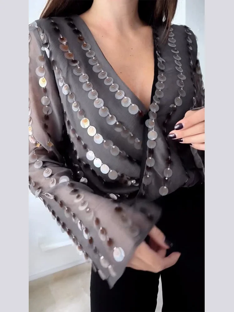 2026 Women's Summer Fashion Party Street jumpsuit sexy deep V-neck sequin solid color pleated long sleeved loose top
2026 Women's Summer Fashion Party Street jumpsuit sexy deep V-neck sequin solid color pleated long sleeved loose top