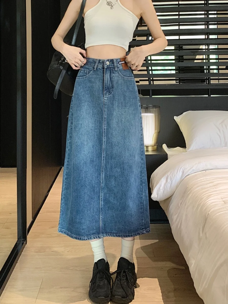 Джинсовая юбка с высокой талией и разрезом, женская летняя юбка больших размеров, А-силуэт, длинная, в корейском стиле, однотонная, миди, для повседневной носки
Джинсовая юбка с высокой талией и разрезом, женская летняя юбка больших размеров, А-силуэт, длинная, в корейском стиле, однотонная, миди, для повседневной носки
