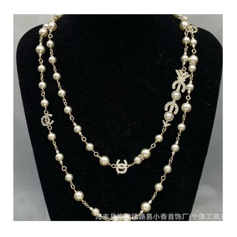 The Double Sweater Chain Early Spring Vacation Collection Is One of The Collection's Signature Accessories
The Double Sweater Chain Early Spring Vacation Collection Is One of The Collection's Signature Accessories