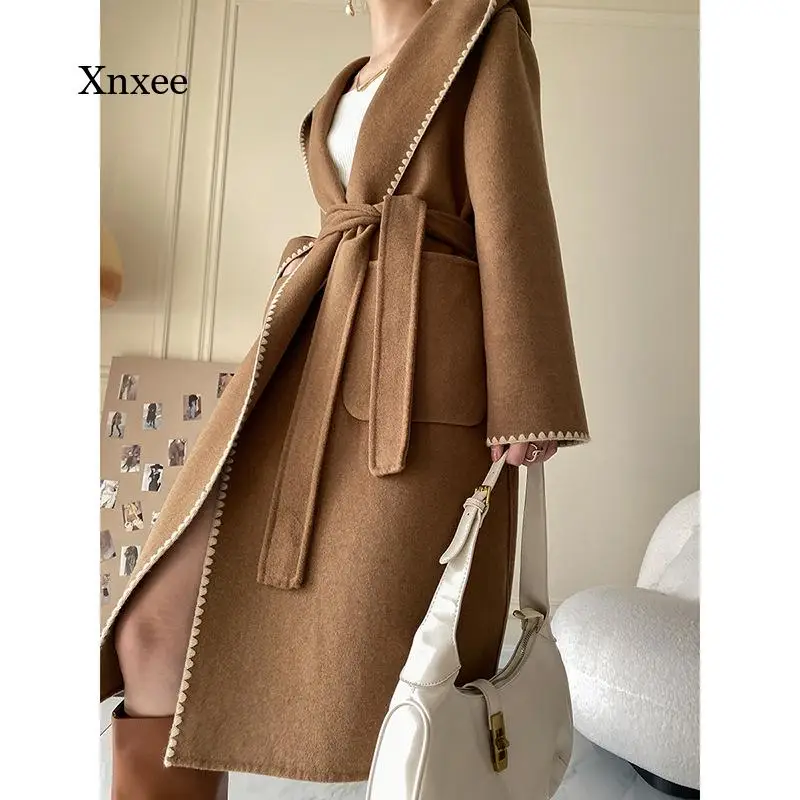 Winter Woolen Hoodie Coat New Women's Autumn Elegant Lady Cardigans Oversized Fashion Windbreaker Lace Up French Long Outwear
Winter Woolen Hoodie Coat New Women's Autumn Elegant Lady Cardigans Oversized Fashion Windbreaker Lace Up French Long Outwear