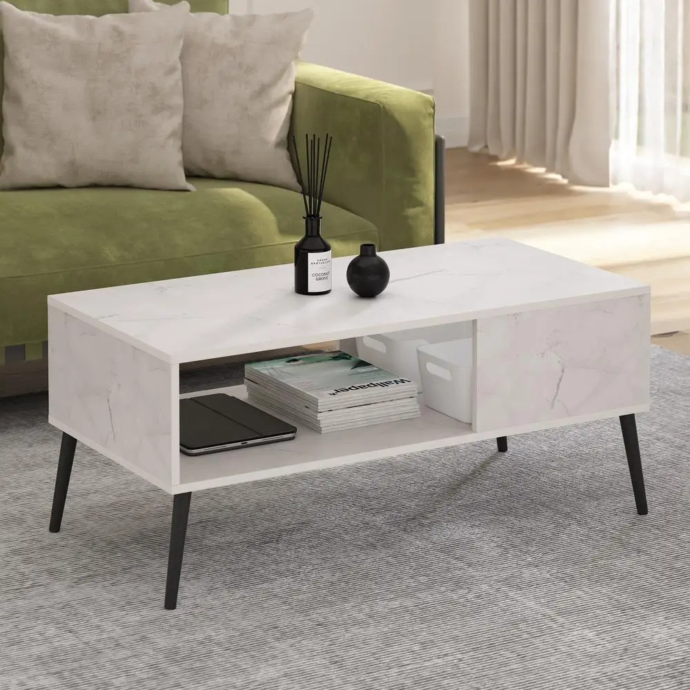 Mid Century Modern Coffee Table Featuring Wooden Legs and White Marble Top
Mid Century Modern Coffee Table Featuring Wooden Legs and White Marble Top