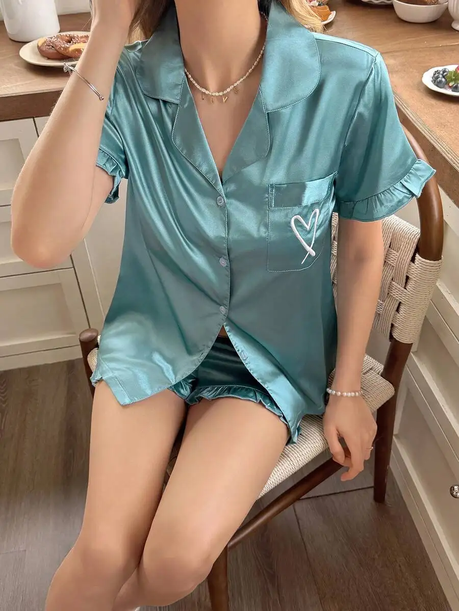 Elegant Embroidered Ruffle Silky Satin Lapel Short Sleeve Pajama Set For Women
Elegant Embroidered Ruffle Silky Satin Lapel Short Sleeve Pajama Set For Women