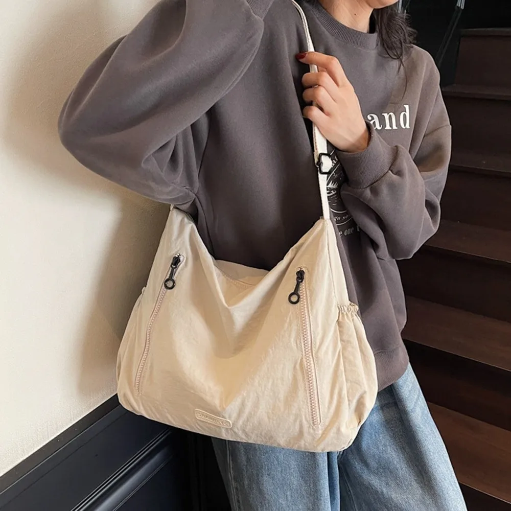 Streetwear Large Capacity Nylon Messenger Bag Casual Waterproof Square Crossbody Bag Solid Color Tote Single Shoulder Bag Travel
Streetwear Large Capacity Nylon Messenger Bag Casual Waterproof Square Crossbody Bag Solid Color Tote Single Shoulder Bag Travel