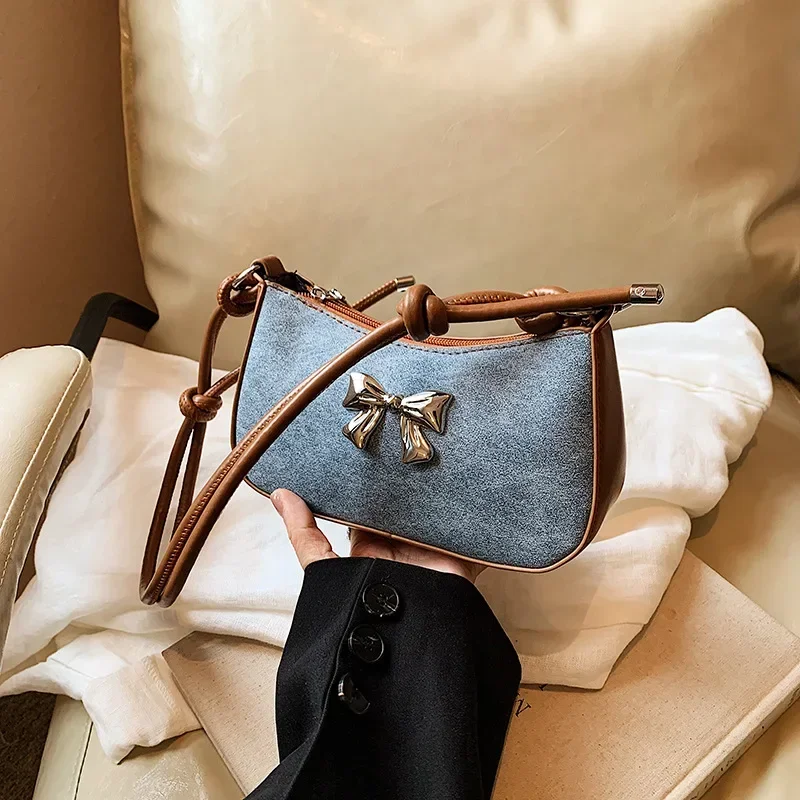 Sweet bow decorative armpit bag women's popular handbag new fashion portable messenger bag
Sweet bow decorative armpit bag women's popular handbag new fashion portable messenger bag