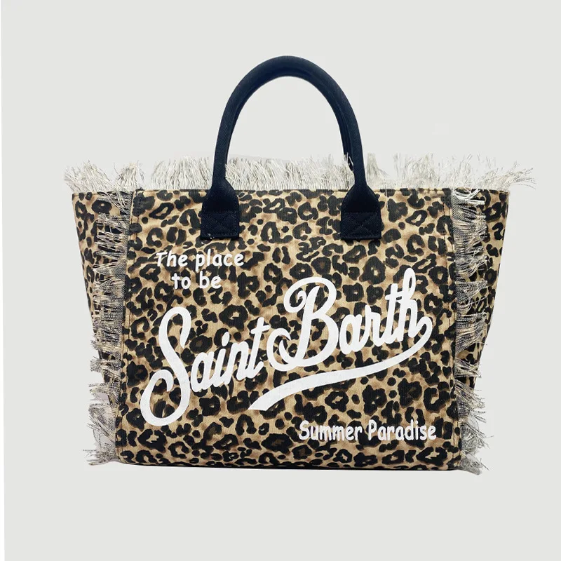 2024 new women's large-capacity leisure travel leopard print canvas handmade fringed handbag tote bag
2024 new women's large-capacity leisure travel leopard print canvas handmade fringed handbag tote bag