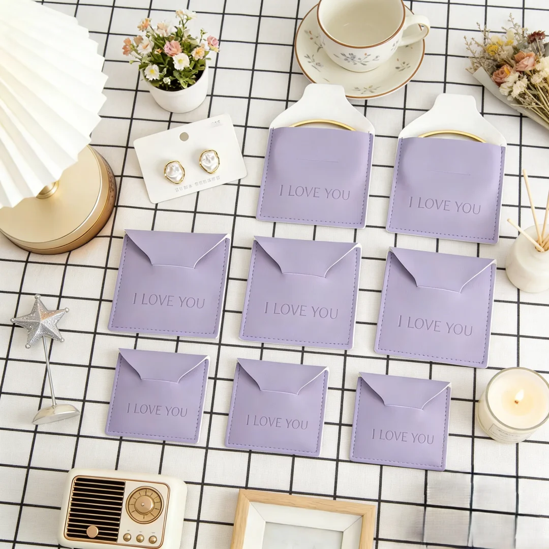 Custom Logo 6x6cm Purple PU Leather Envelope Pouches Jewelry Bijoux Container for Earrings Rings Necklace Gift Packaging Bags
Custom Logo 6x6cm Purple PU Leather Envelope Pouches Jewelry Bijoux Container for Earrings Rings Necklace Gift Packaging Bags