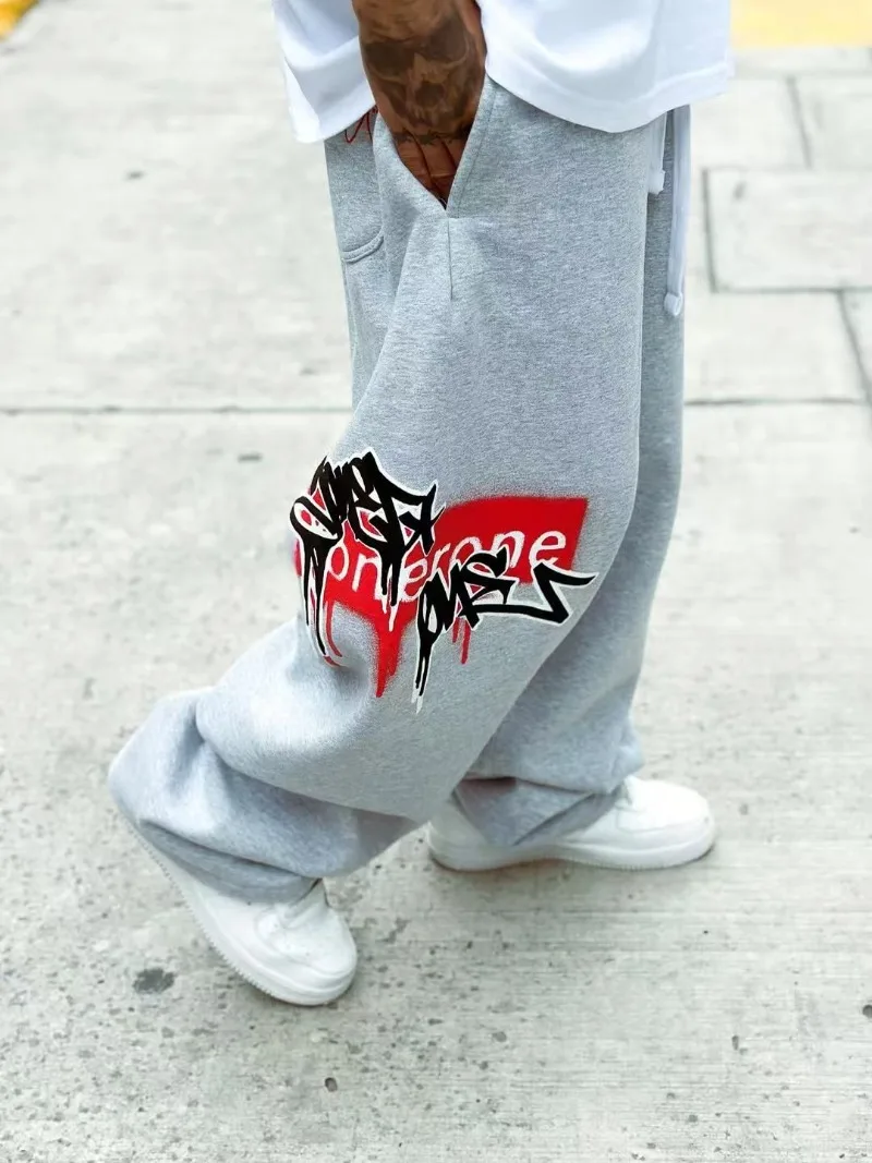 Streetwear high street letter graffiti men wide-leg pants Y2K Goth fashion loose casual pants Couple fashion trendy baggy pants
Streetwear high street letter graffiti men wide-leg pants Y2K Goth fashion loose casual pants Couple fashion trendy baggy pants