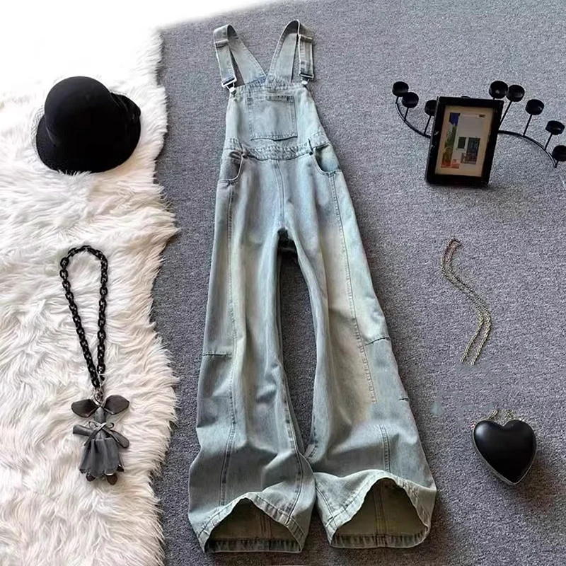 Светлые джинсовые комбинезоны женские осенью 2023 года, новый стираный и полированный белый свободный комбинезон с высокой талией и широкими штанинами
Светлые джинсовые комбинезоны женские осенью 2023 года, новый стираный и полированный белый свободный комбинезон с высокой талией и широкими штанинами